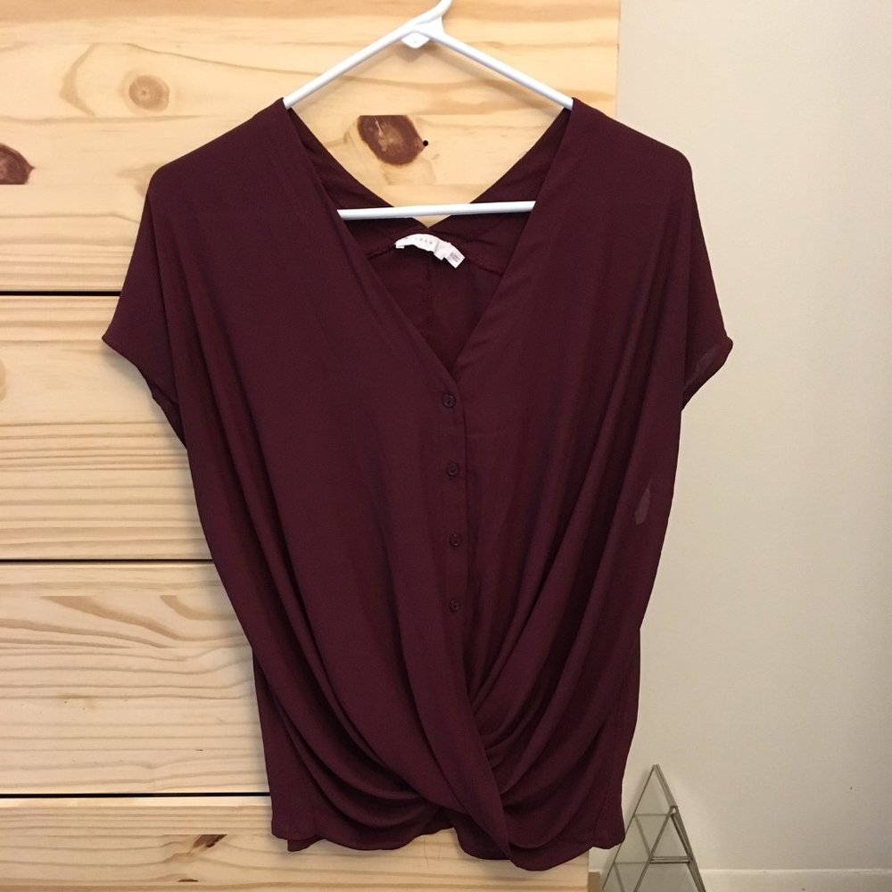 Lush V-neck button-up top with twist hem
